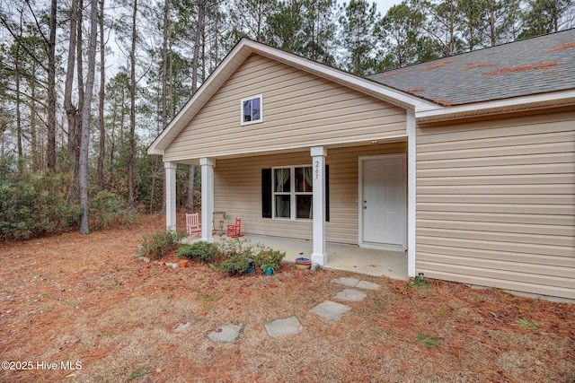 entrance to property with a porch