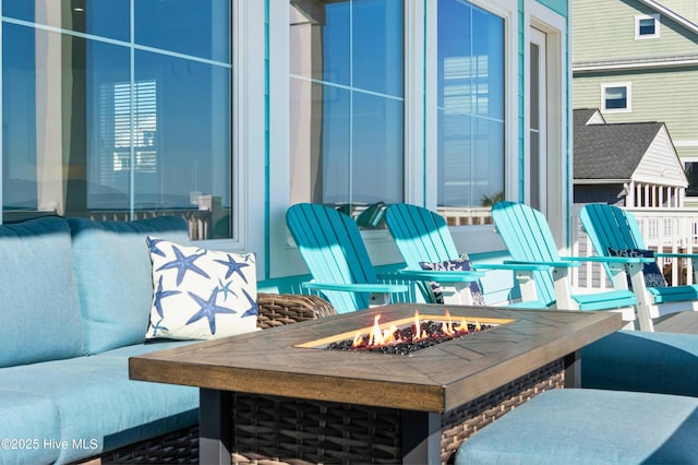 view of patio / terrace with an outdoor fire pit