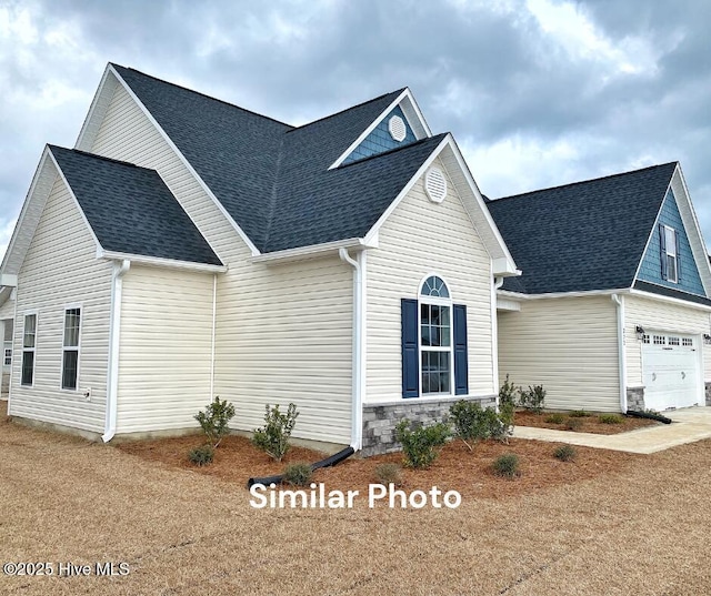 view of front of home with a garage