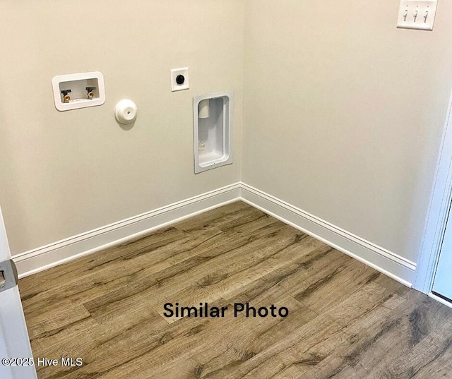 washroom featuring hookup for an electric dryer, gas dryer hookup, wood-type flooring, and hookup for a washing machine