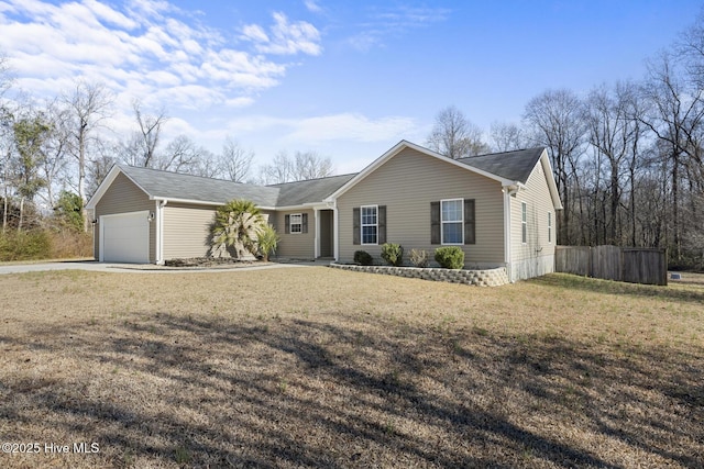 ranch-style home featuring a garage and a front yard