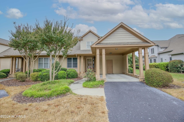 view of front of house featuring a carport