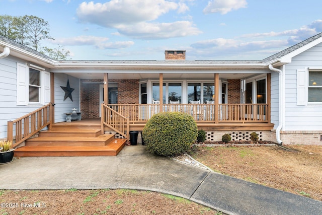 property entrance with a porch