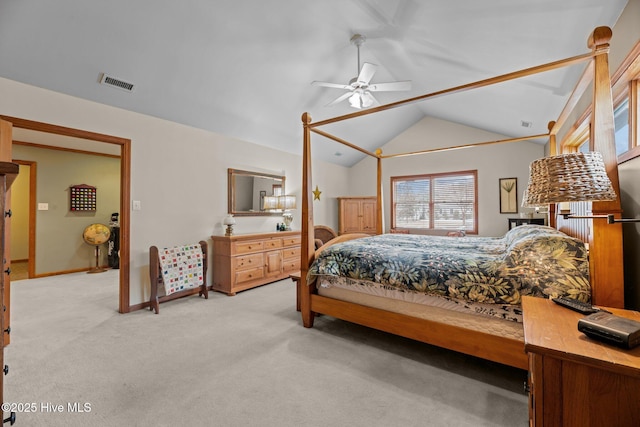 bedroom with lofted ceiling, light carpet, and ceiling fan