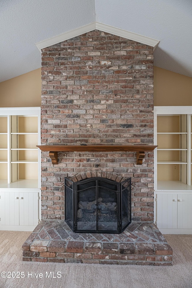 room details with a fireplace, a textured ceiling, and carpet