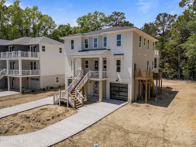 633 Vale Dr, Wilmington, NC 28411 - back of house with stairs, board and batten siding, a balcony, and central AC