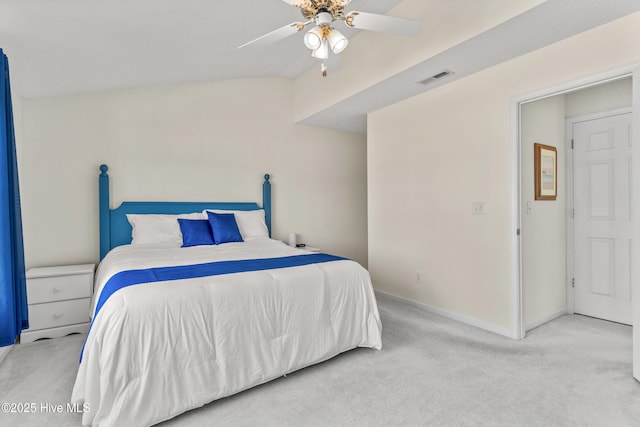 bedroom with baseboards, visible vents, a ceiling fan, vaulted ceiling, and carpet flooring