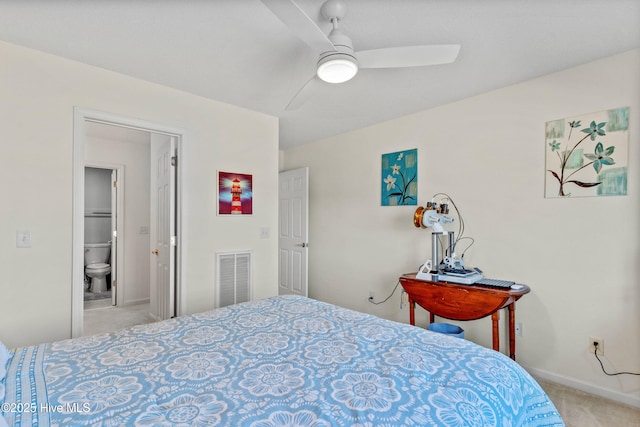 carpeted bedroom with baseboards, visible vents, and a ceiling fan