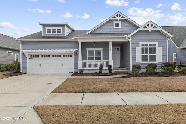 craftsman house featuring a garage and covered porch