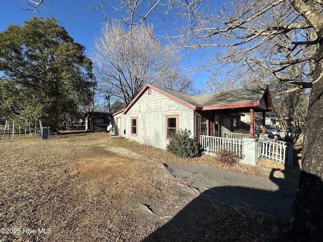 view of home's exterior featuring a porch