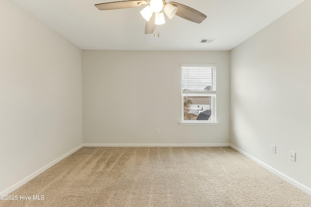 unfurnished room featuring carpet floors and ceiling fan