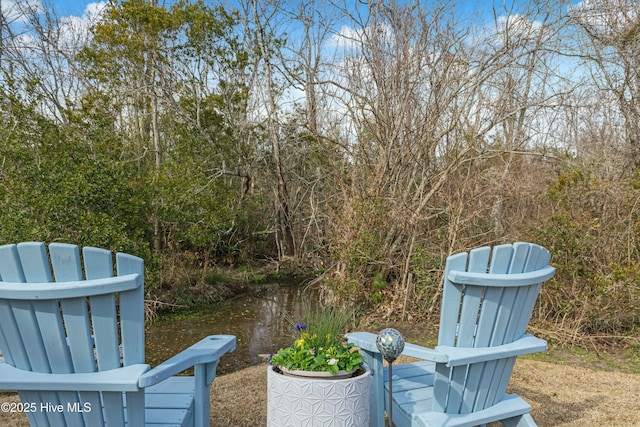 view of patio / terrace featuring a water view