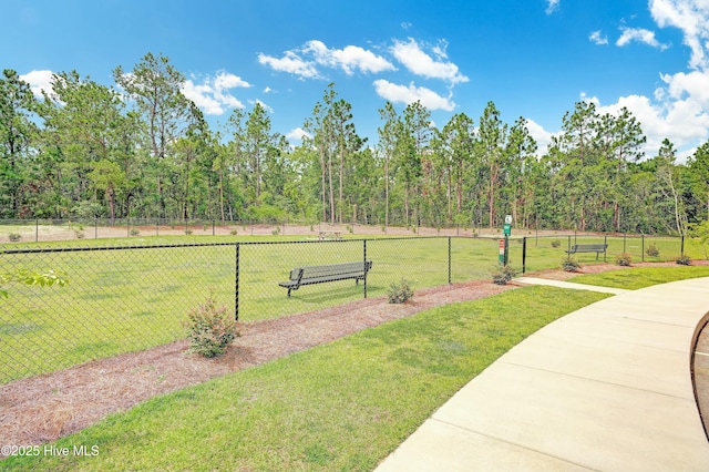 surrounding community featuring a yard