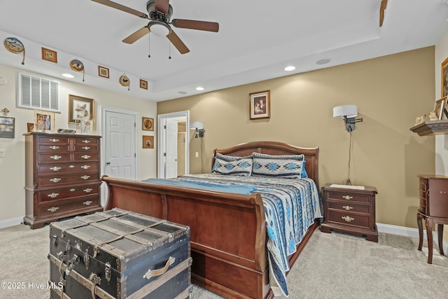 bedroom featuring ceiling fan and light carpet