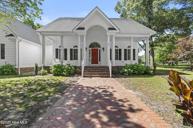 132 Lake Wood Dr, Edenton, NC 27932 - greek revival house featuring a porch and roof with shingles