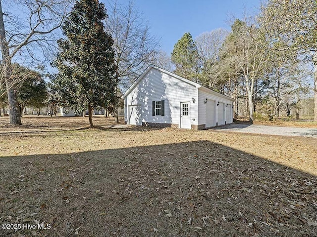 view of property exterior featuring a garage