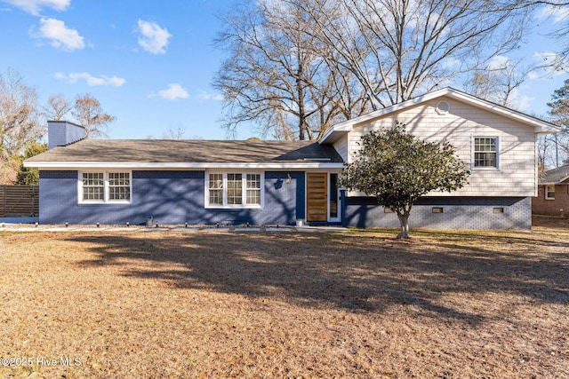 ranch-style house with a front lawn