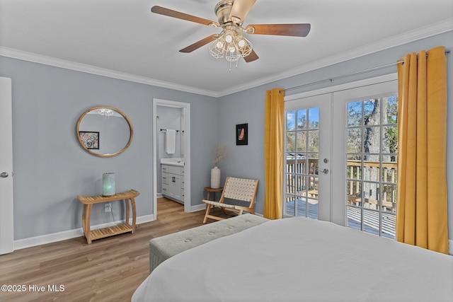 bedroom featuring crown molding, hardwood / wood-style flooring, ensuite bath, access to outside, and french doors