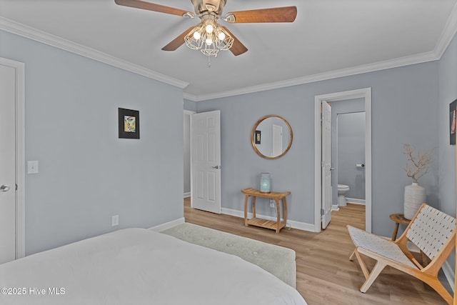 bedroom with ceiling fan, ornamental molding, connected bathroom, and light hardwood / wood-style flooring