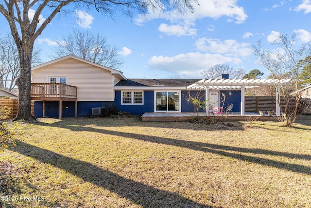 rear view of house with a wooden deck, a pergola, a lawn, and central air condition unit