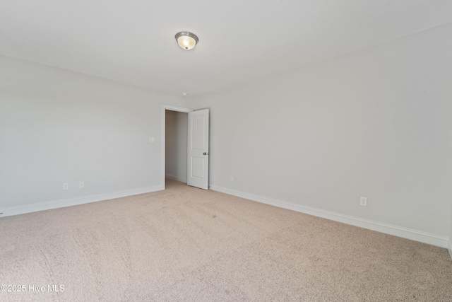 empty room featuring carpet floors