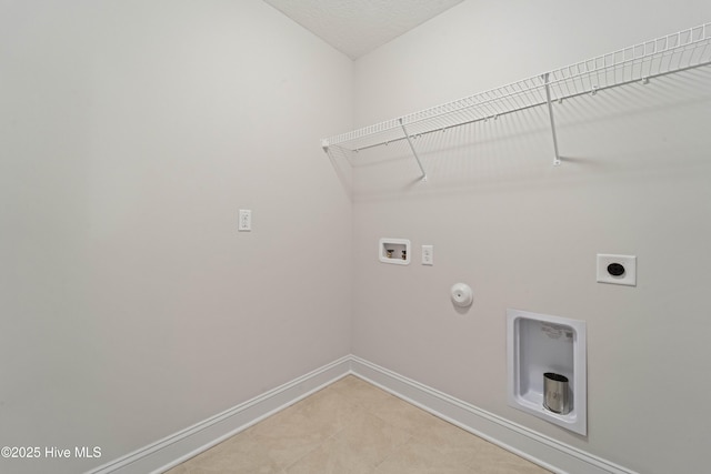 laundry area with hookup for a washing machine, gas dryer hookup, and hookup for an electric dryer