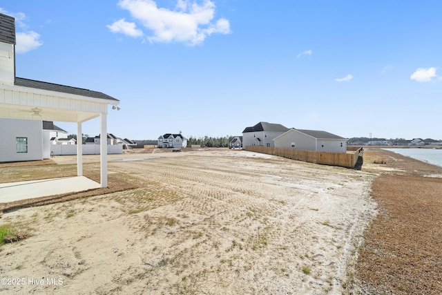 view of yard with a water view