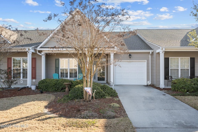 ranch-style home featuring a garage