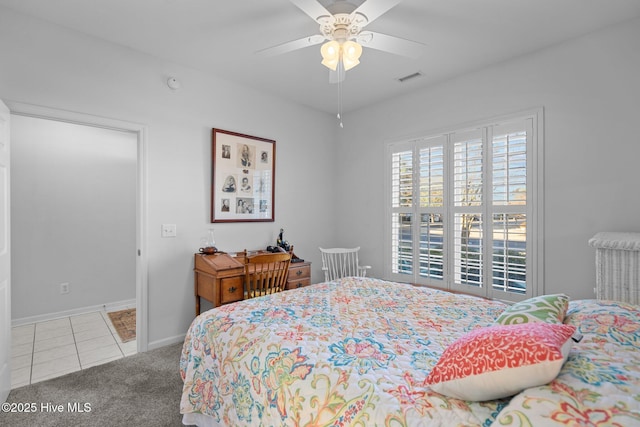 bedroom with ceiling fan and carpet