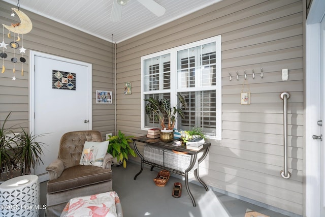 exterior space featuring ceiling fan