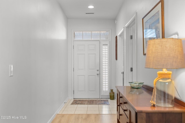 view of tiled foyer entrance