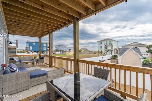 deck with an outdoor hangout area