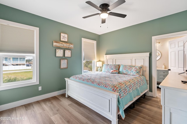 bedroom featuring ceiling fan and light hardwood / wood-style floors