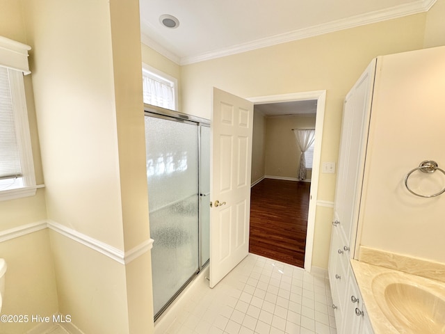 6104 Falcon Dr, New Bern, NC 28560 - bathroom featuring a stall shower, crown molding, tile patterned flooring, and vanity