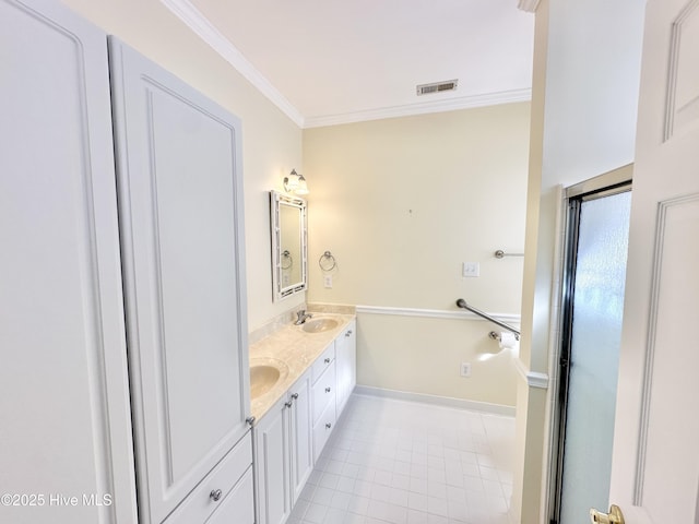 6104 Falcon Dr, New Bern, NC 28560 - bathroom featuring double vanity, crown molding, and tile patterned flooring