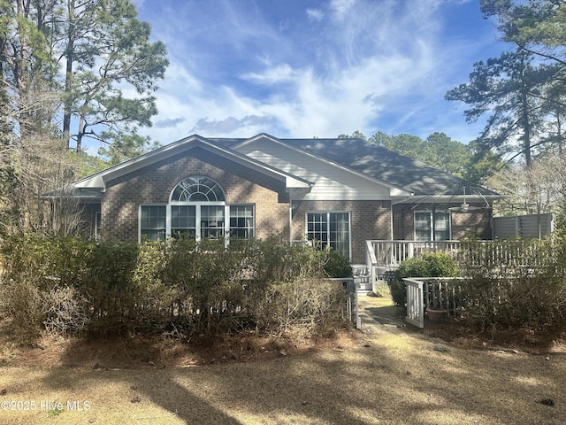 exterior space with brick siding