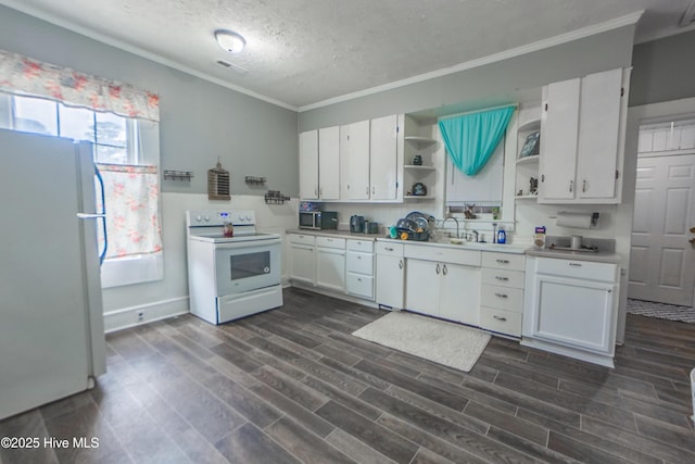 kitchen with sink, white appliances, white cabinetry, and a textured ceiling