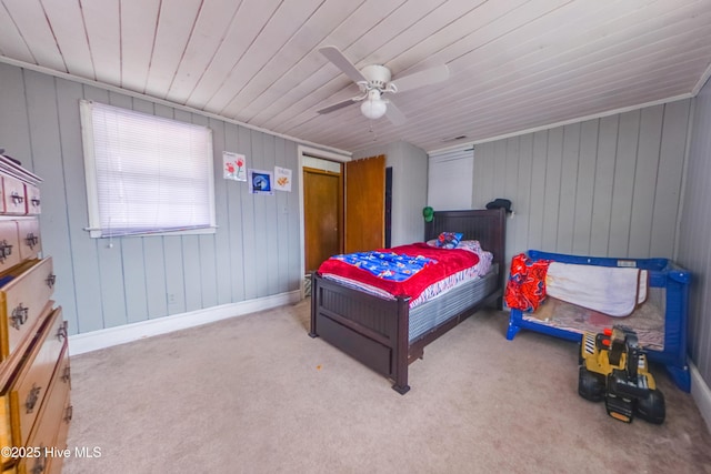 bedroom featuring light colored carpet and ceiling fan