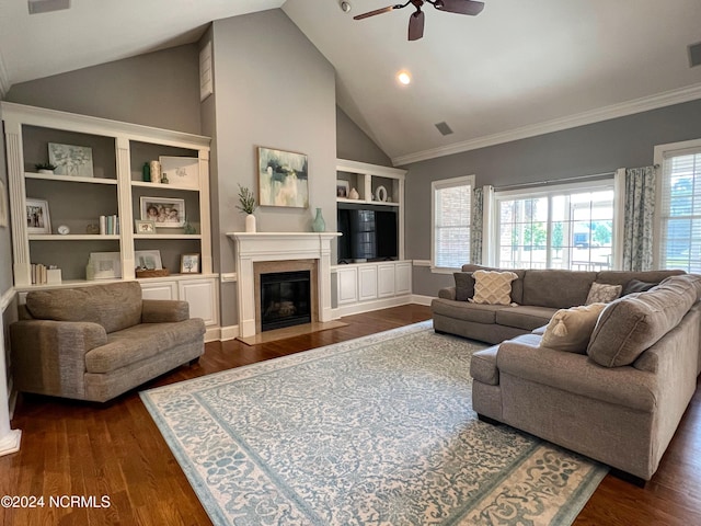 living room with ceiling fan, dark hardwood / wood-style flooring, crown molding, and lofted ceiling