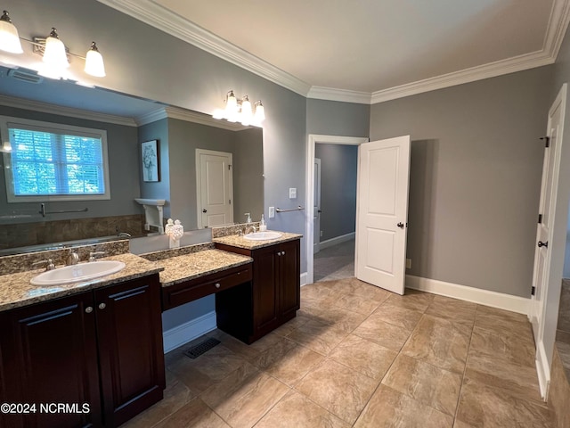 bathroom featuring tile patterned floors, vanity, ornamental molding, and a bath