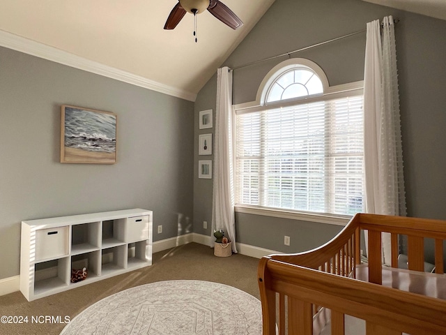 carpeted bedroom with ceiling fan and vaulted ceiling