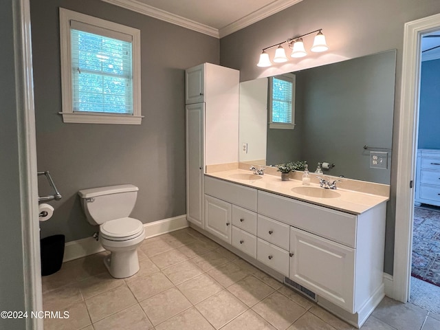 bathroom with tile patterned floors, vanity, toilet, and ornamental molding