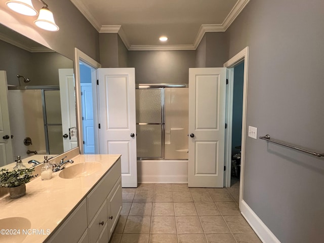 bathroom with crown molding, tile patterned flooring, vanity, and combined bath / shower with glass door