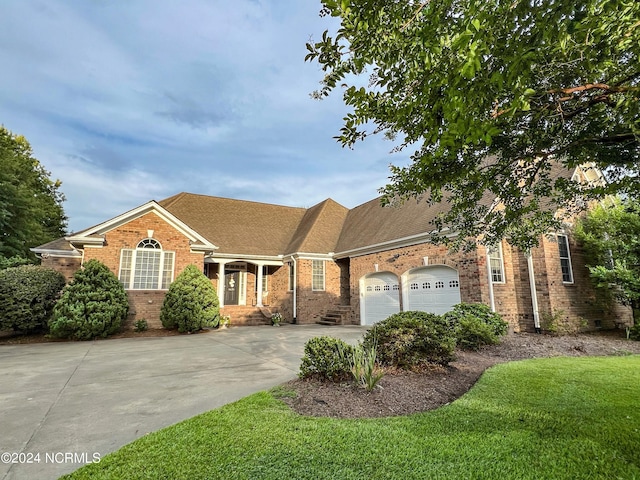 single story home featuring a garage