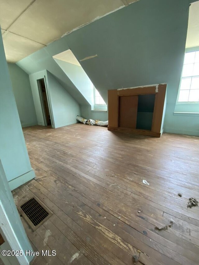 4313 Caratoke Hwy, Barco, NC 27917 - bonus room with visible vents, lofted ceiling, and hardwood / wood-style flooring