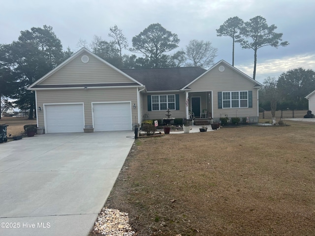 single story home featuring a garage and a front lawn