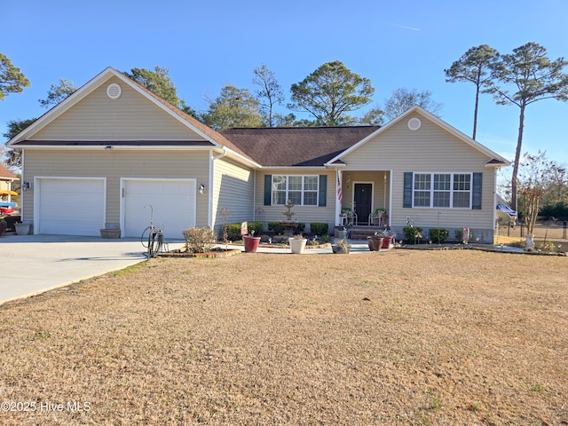 single story home featuring a garage and a front lawn