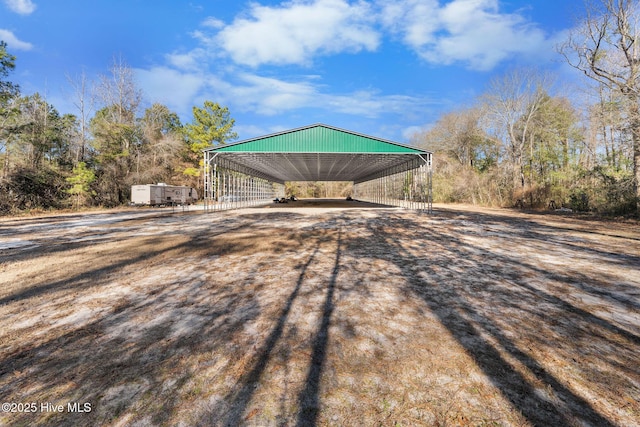 exterior space with a detached carport