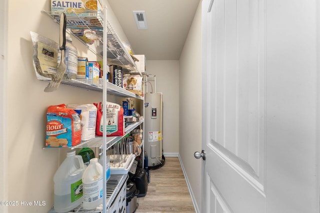 pantry with electric water heater