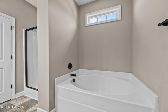 402 Kinroff Dr, Hubert, NC 28539 - bathroom with a bath and a shower stall